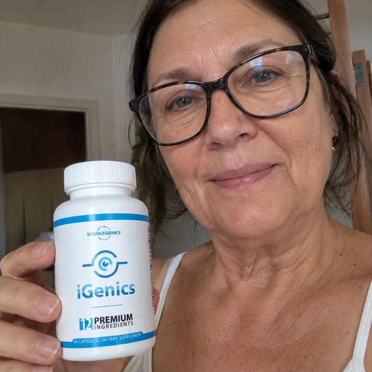 Person taking iGenics for vision support